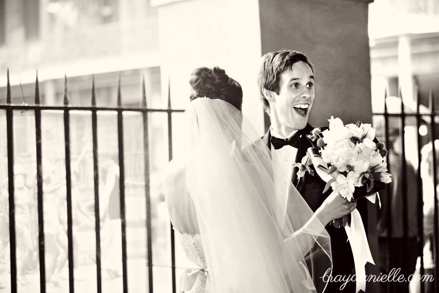 happy groom first look