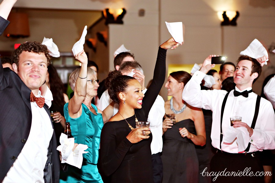 Wedding guest waving the white napkin, wedding by Bray Danielle Photography