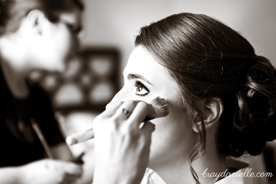 bride getting her makeup done