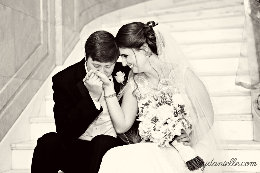 bride and groom on stairs