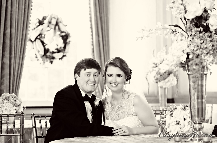 bride and groom seated 