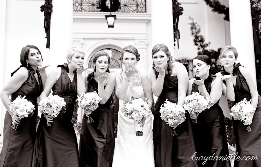 bride and bridesmaid blowing kisses