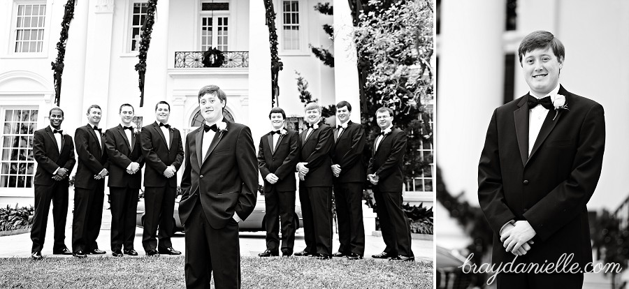 Groom and groomsmen posed outside