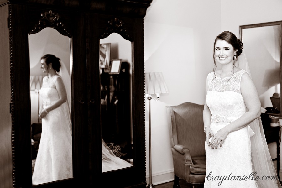 bride in front of mirror