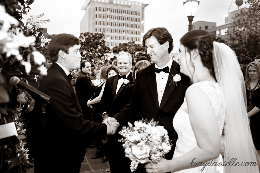 father of the bride shaking the grooms hand