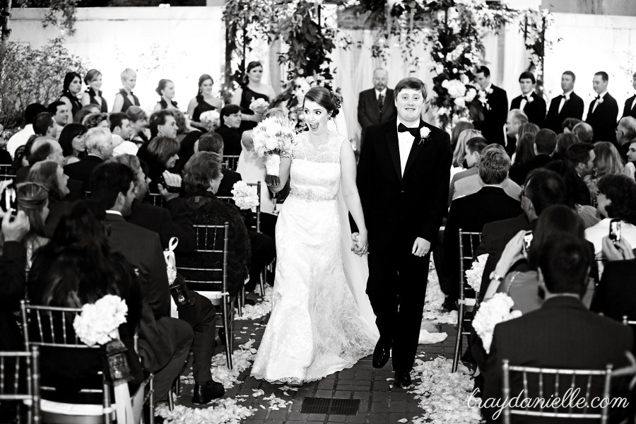 bride and groom walking down the aisle