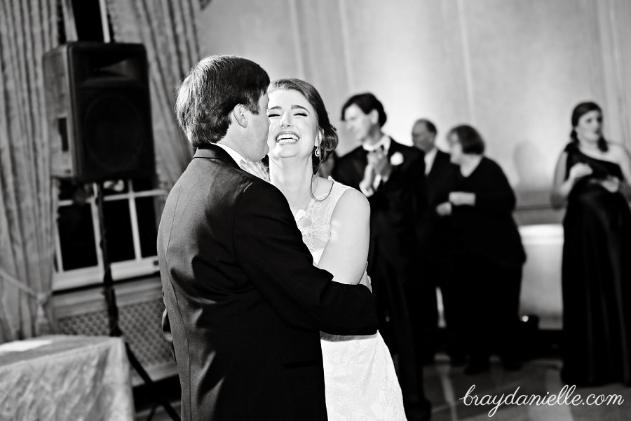 bride laughing while dancing
