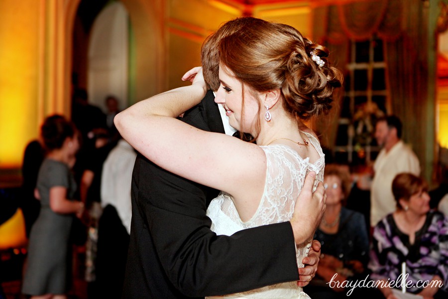 bride and groom hugging