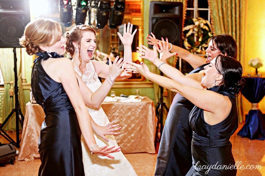 bride and bridesmaid dancing