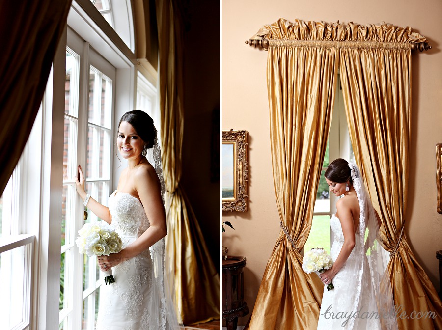 Bride posing by window