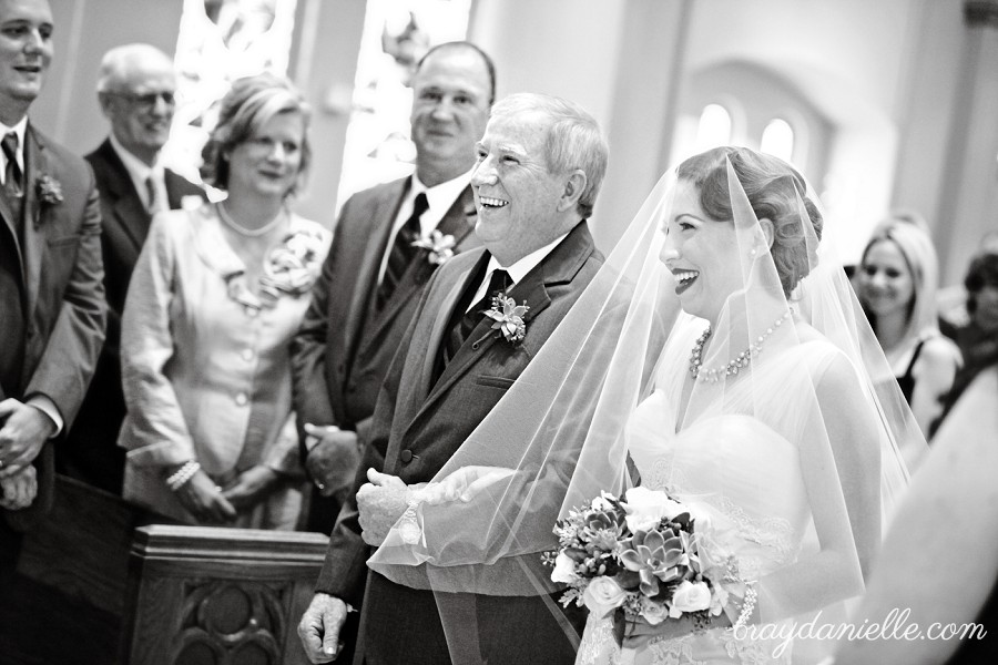 father of the bride walking her down the aisle