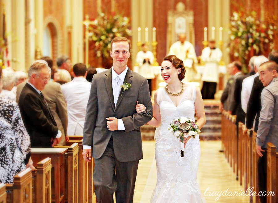 Bride and groom walking down the aisle