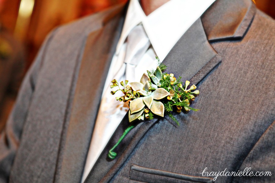 close up of groom's boutonniere 