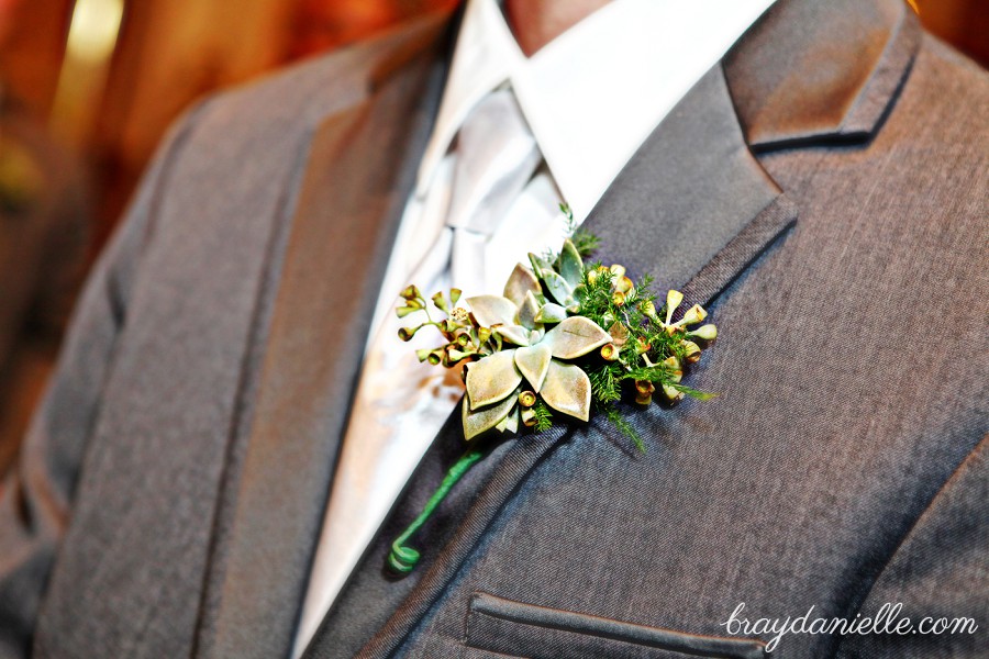 close up of groom's boutonniere