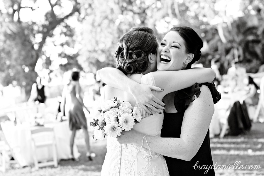 Bridesmaid catching the bouquet