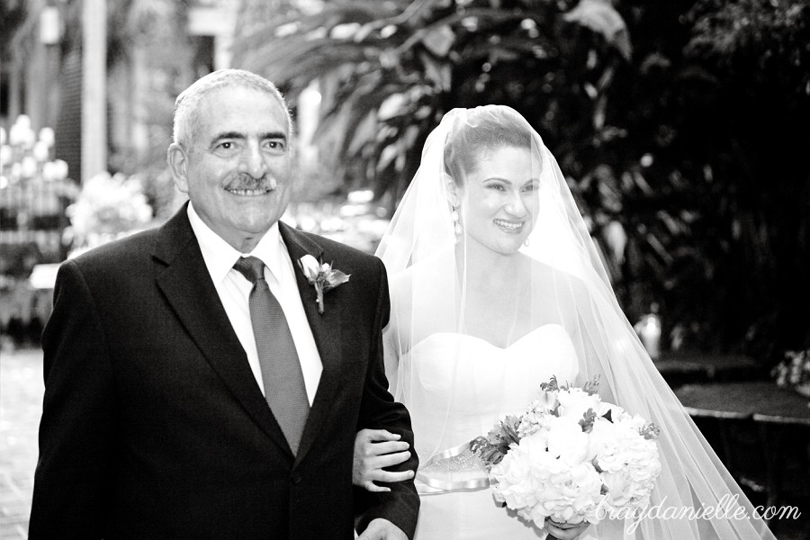 Father of the bride walking bride down the aisle