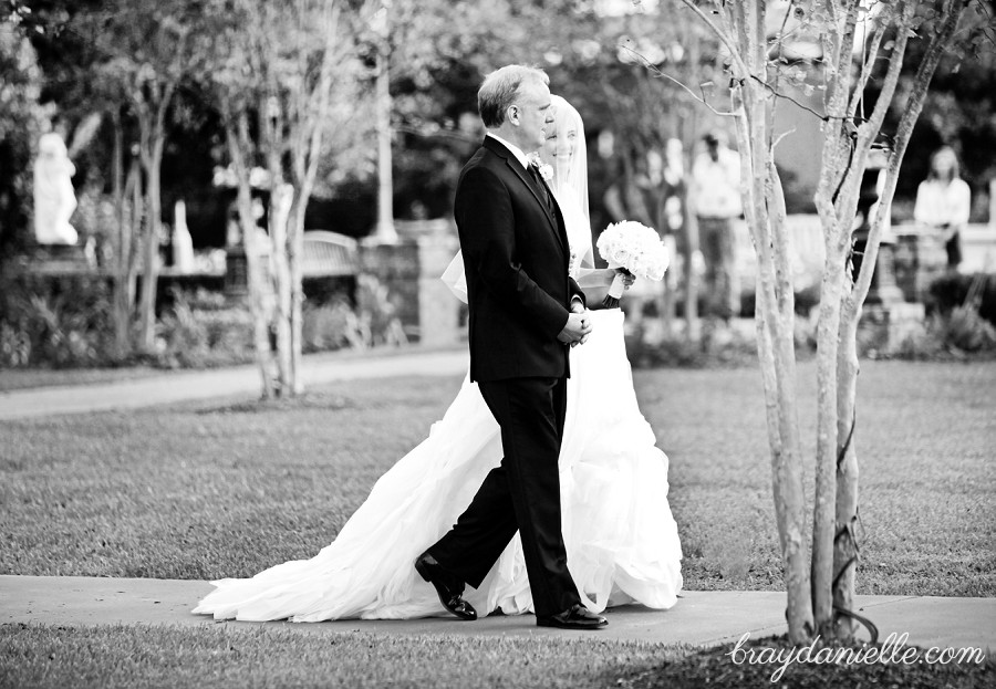 father of the bride walking bride out