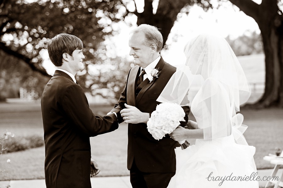 father of the bride shaking grooms hand