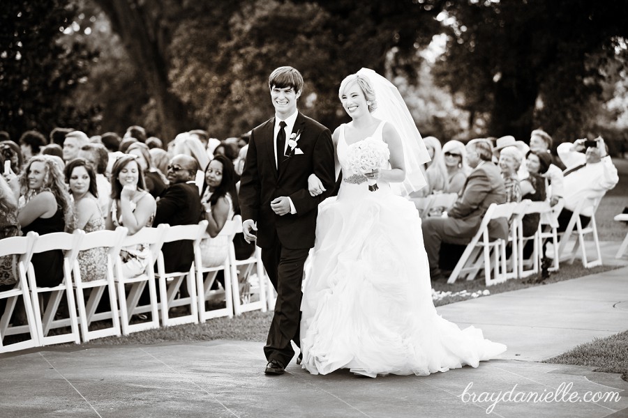 bride and groom walking down the aisle