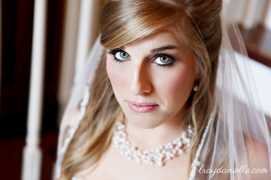 bride close up green eyes pearls veil by Bray Danielle Photography 