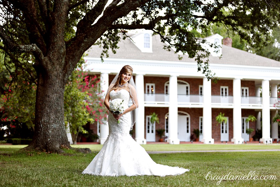 bride in front of plantation by Bray Danielle Photography 