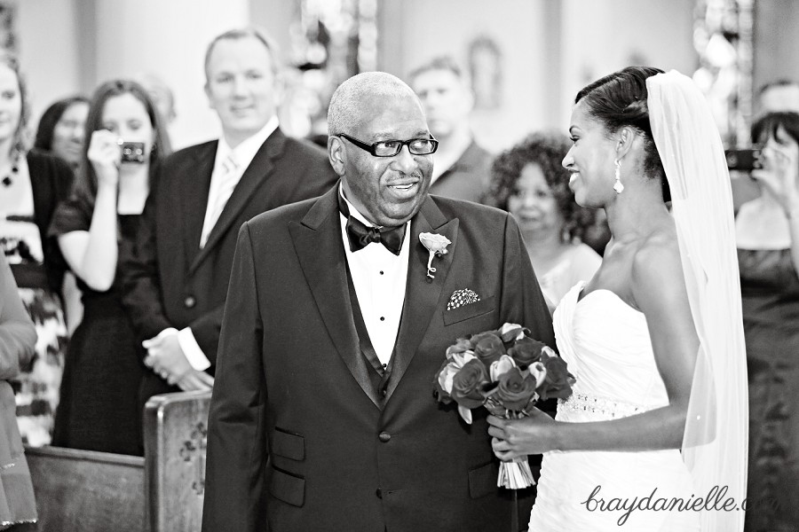 Father of the bride smiling at bride, wedding at St Louis Cathedral in New Orleans