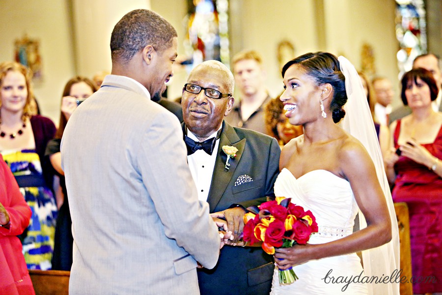 Father of the bride giving her away, wedding at St Louis Cathedral in New Orleans