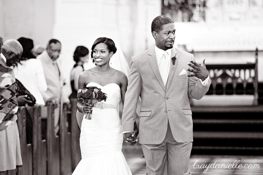 bride and groom walking down the aisle