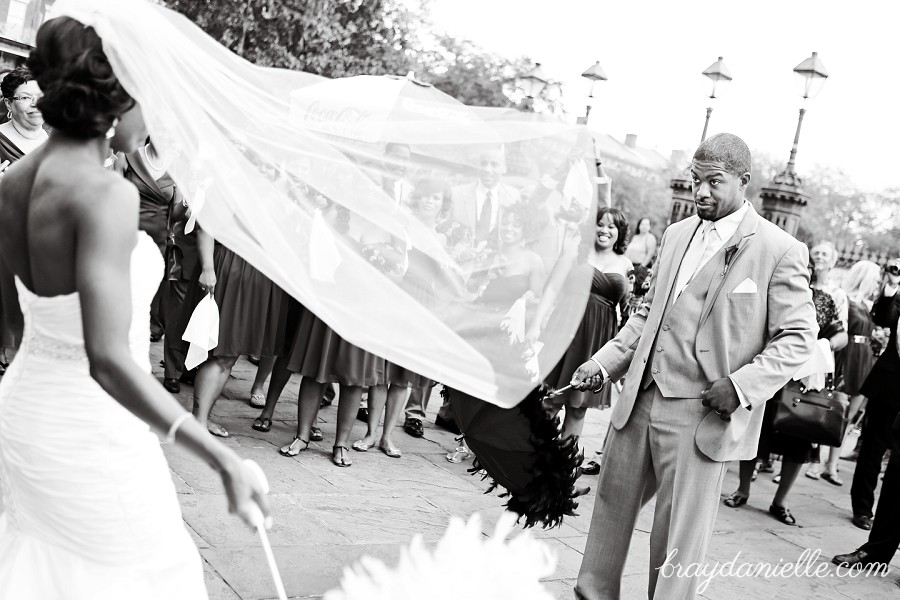 bride and groom dancing outside