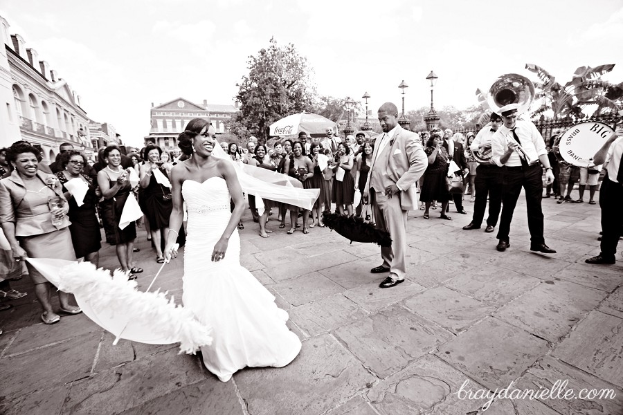 bride and groom dancing outide in new orleans