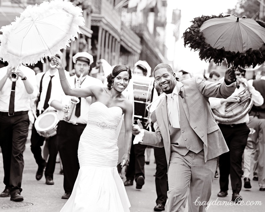 Bride and groom with jazz band outside