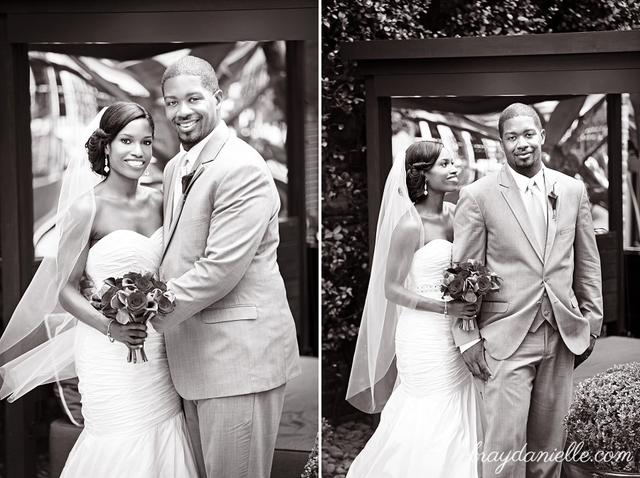 black and white posed photo of bride and groom