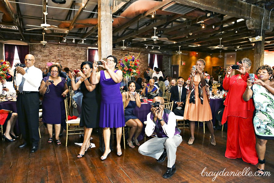 wedding guests taking photos