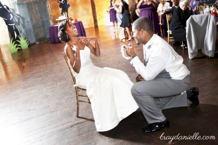 groom getting the garter