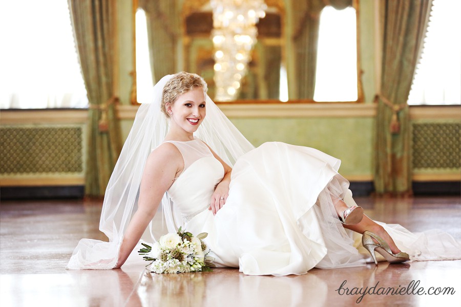 Bridal sitting on the ground by Bray Danielle Photography