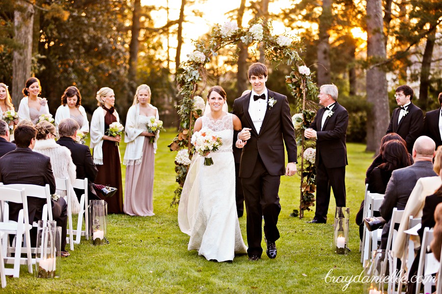 Bride and groom walking down aisle