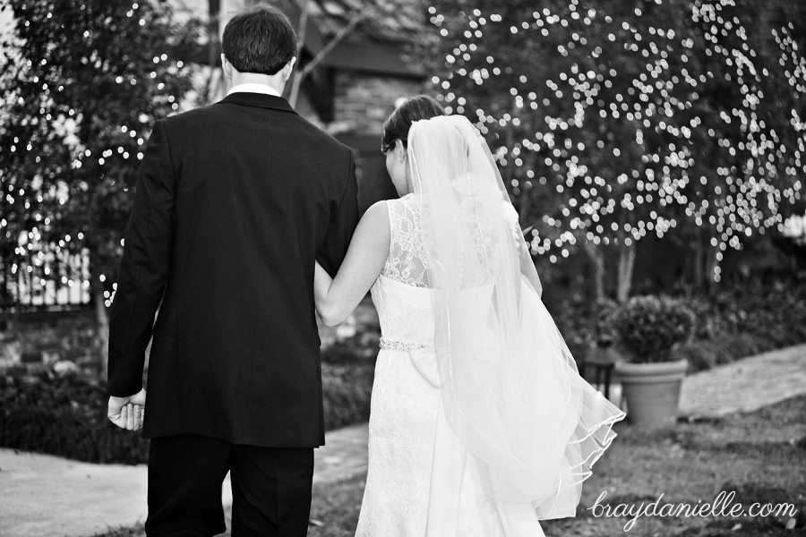 bride and groom from behind
