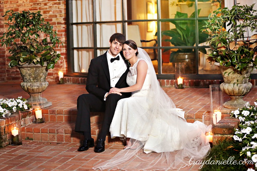 bride and groom on steps