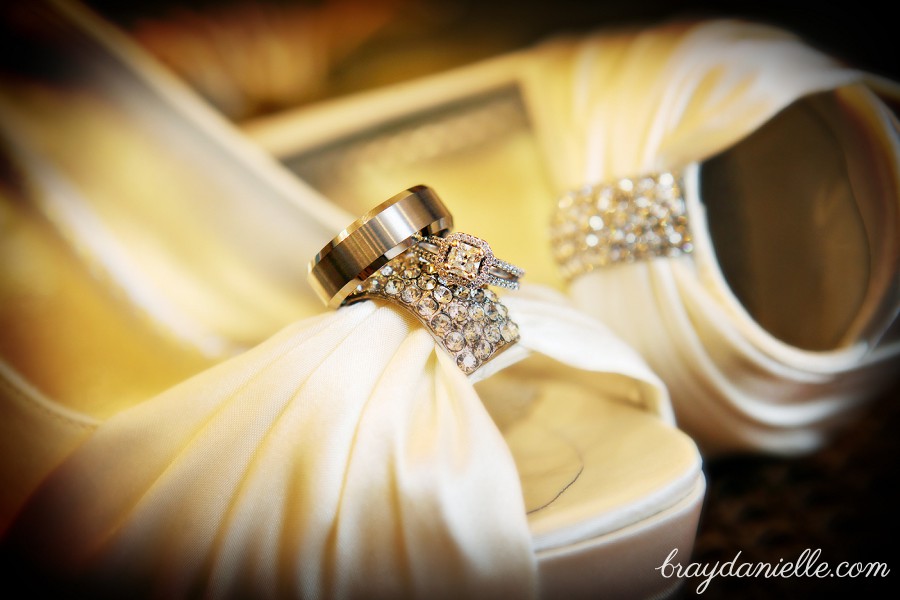 Wedding rings on bridal shoes