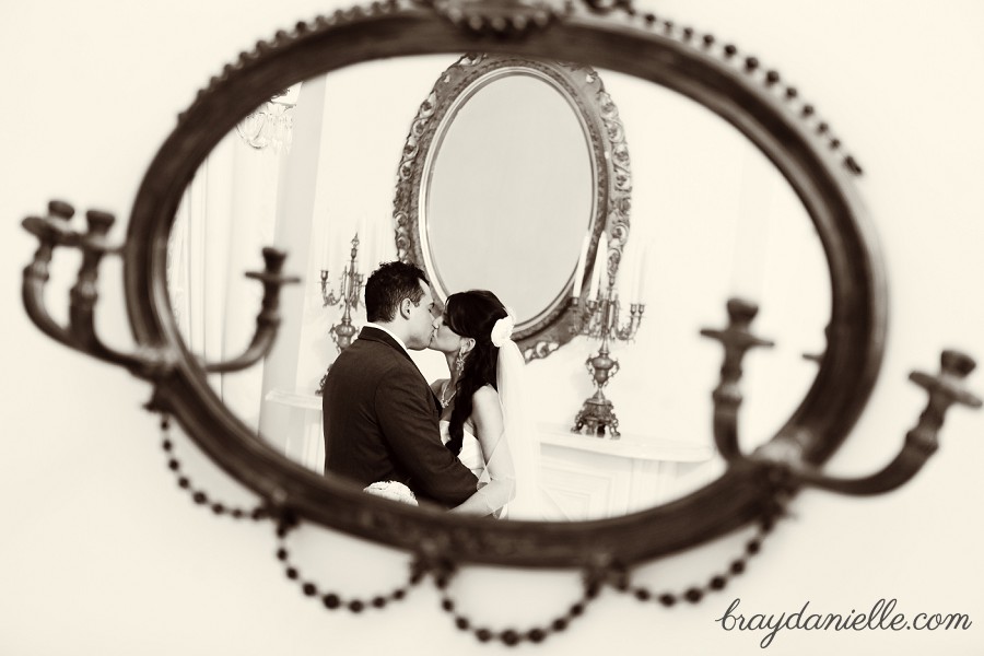 bride and groom in mirror