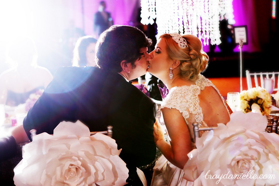 Bride and Groom Kissing at Reception